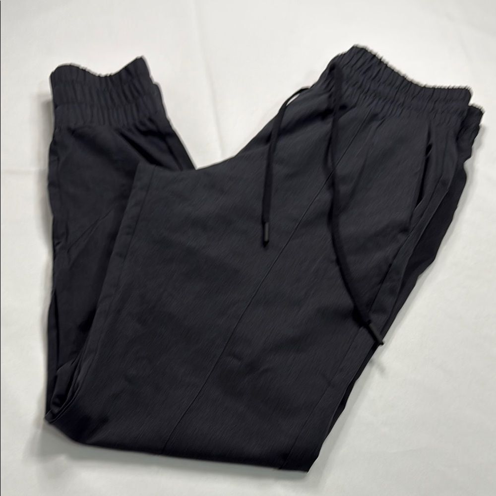 ZYIA Black Sweatpants with Tapered Legs and Elastic Cuffs
